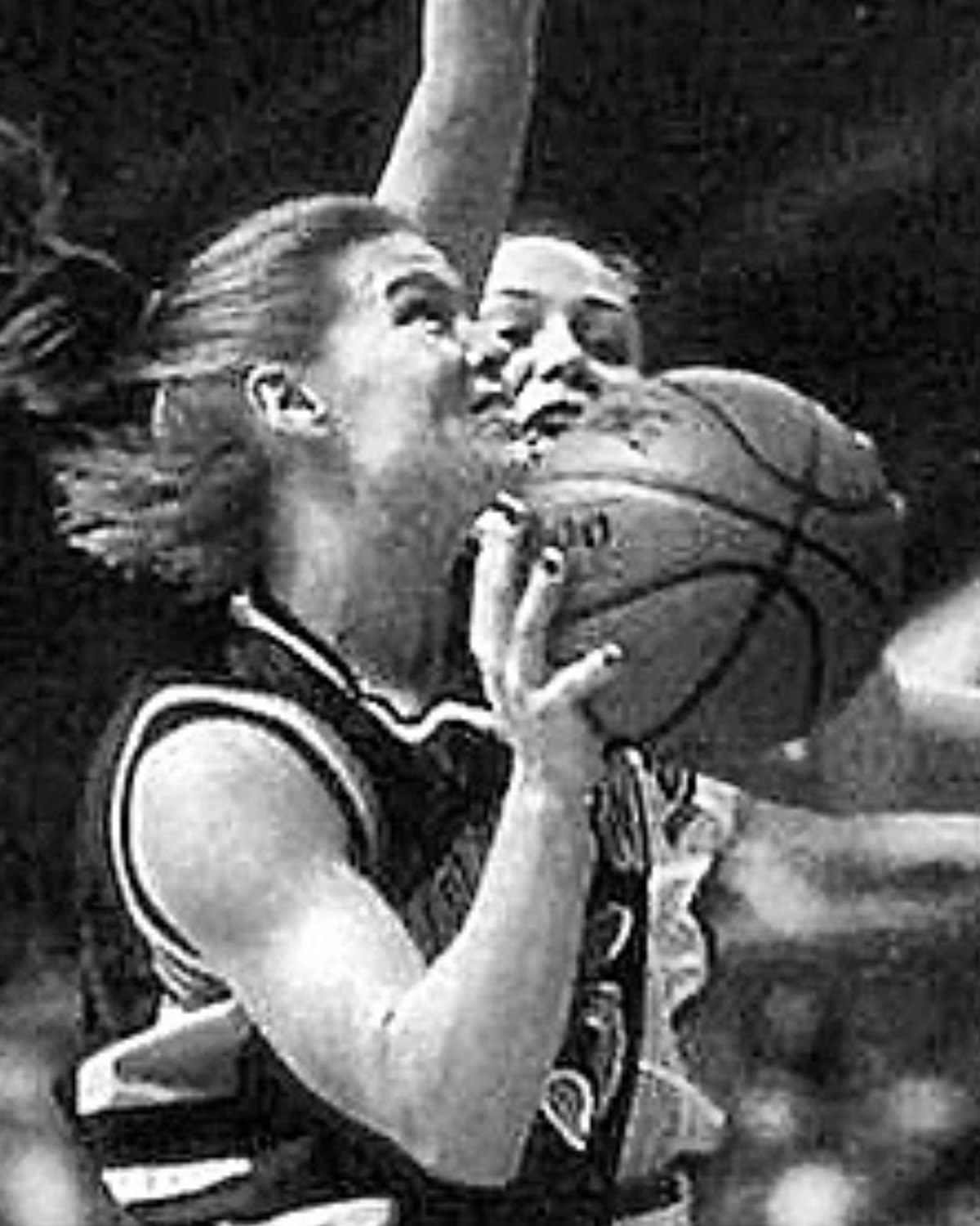 Katie Smrcka-Duffy Fudd driving to the basket during her playing career
